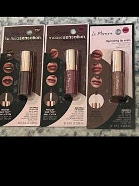 Le Mercerie Hydrating Lip Stain: scarlet flame/ velvet mauve/ coral dream.
